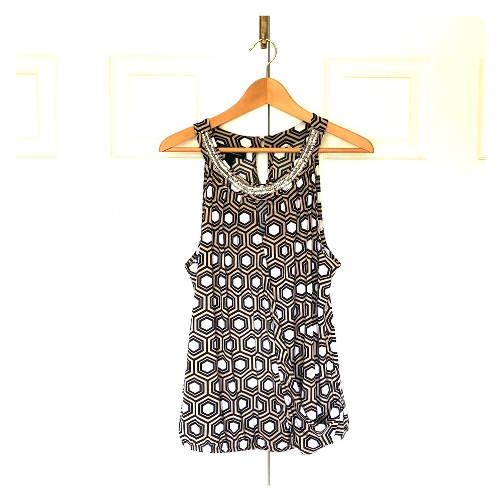 Faux wrap halter tank with embellished neckline.